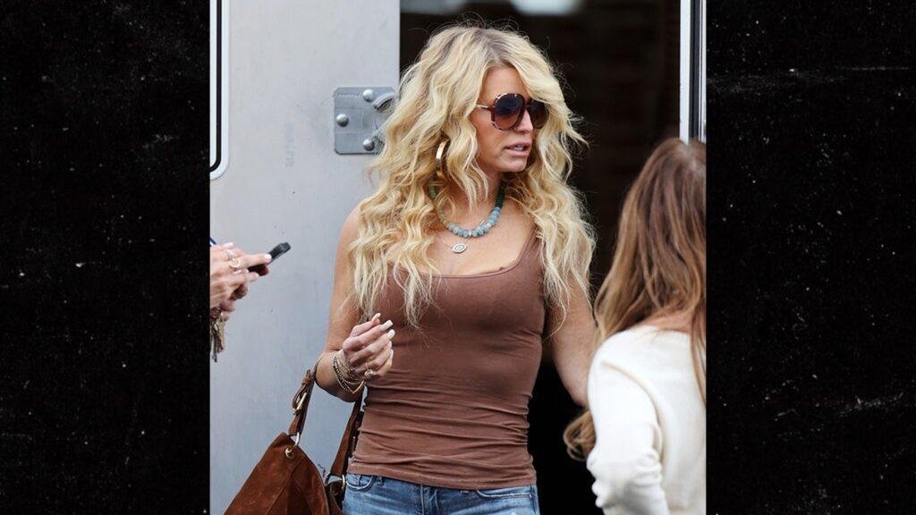 Jessica Simpson Shows Off Dramatic Weight Loss with Farrah Fawcett Twist