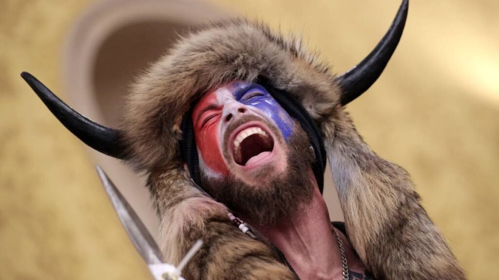Jake Angeli, horned man who stormed Capitol, refuses to eat as guards won't feed him 'organic food' - NZ Herald