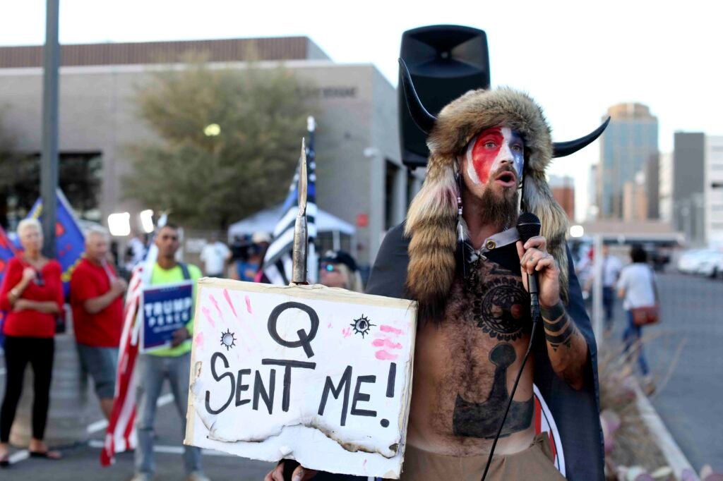 Lawyer for 'QAnon shaman' claims client's health deteriorating in jail without organic food - POLITICO